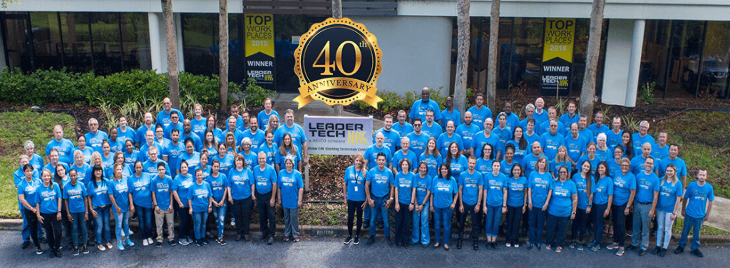 Leader Tech employees celebrating 40 years of business