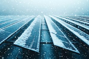 Snow falling on solar panels